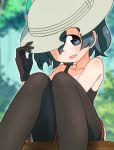  1girl bare_shoulders black_eyes black_gloves black_legwear black_tank_top blurry blurry_background collarbone commentary_request gloves green_hair hand_on_headwear hat hat_over_one_eye highres kaban_(kemono_friends) kemono_friends looking_at_viewer no_shirt one_eye_covered pantyhose pantyhose_under_shorts parted_lips sat-c short_hair shorts sitting smile solo white_hat 