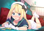  1girl blonde_hair blue_eyes blue_sailor_collar blush commentary_request couch crayon dress gintarou_(kurousagi108) gloves hat jervis_(kantai_collection) kantai_collection light_blush long_hair looking_at_viewer lying nose_blush on_stomach open_mouth sailor_collar sailor_dress sailor_hat short_sleeves solo tanabata white_dress white_gloves white_hat 