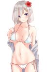  1girl bikini blue_eyes blush breasts closed_mouth flower hair_between_eyes hair_flower hair_ornament hairclip hamakaze_(kantai_collection) kantai_collection large_breasts looking_at_viewer medium_hair silver_hair simple_background solo swimsuit u0709 underwear undressing white white_background white_bikini white_swimsuit 