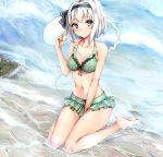  1girl amagi_(amagi626) bare_arms bare_legs bare_shoulders barefoot bikini black_hairband black_ribbon blue_eyes blush breasts cleavage collarbone commentary_request eyebrows_visible_through_hair full_body green_bikini hair_ribbon hairband hand_up highres konpaku_youmu konpaku_youmu_(ghost) looking_at_viewer medium_breasts navel ribbon rock sand shiny shiny_skin short_hair silver_hair sitting smile solo stomach swimsuit thighs touhou wariza water 