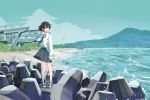  1girl black_neckwear brown_eyes brown_hair collarbone collared_shirt day grey_skirt long_sleeves looking_away mountainous_horizon necktie ocean original outdoors sakeharasu scenery shirt shoes short_hair skirt sky sneakers solo standing wind_turbine windmill 