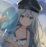  1girl alternate_costume bangs bare_shoulders black_hat blue_eyes blush breasts clouds collarbone dawn eyebrows_visible_through_hair flat_cap hair_between_eyes hat hibiki_(kantai_collection) highres holding holding_innertube innertube kantai_collection long_hair looking_at_viewer miko_fly outdoors sidelocks signature silver_hair small_breasts smile solo swimsuit upper_body 