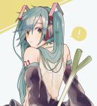  1girl aqua_eyes aqua_hair bare_shoulders closed_mouth commentary detached_sleeves eyebrows_visible_through_hair from_behind green_eyes green_hair hatsune_miku headphones headset highres long_hair looking_at_viewer looking_back skirt sleeveless solo spring_onion tattoo twintails very_long_hair vocaloid ziuuun 