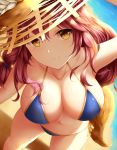  1girl animal_ears bikini blue_bikini breasts cleavage close-up collarbone ears_through_headwear fang fate/grand_order fate_(series) fox_ears groin hat highres large_breasts looking_at_viewer looking_down navel ocean open_mouth pink_hair side-tie_bikini solo straw_hat sun_hat swimsuit tamamo_(fate)_(all) tamamo_no_mae_(fate) tamamo_no_mae_(swimsuit_lancer)_(fate) umbrella wsman yellow_eyes 