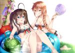  2girls adapted_costume ahoge alternate_hairstyle bikini blue_eyes braid brown_hair commentary commentary_request fan food fruit hair_ornament hairclip kantai_collection long_hair mashiro_aa multiple_girls murasame_(kantai_collection) shigure_(kantai_collection) single_braid swimsuit twintails watermelon 