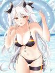  1girl antenna_hair azur_lane bangs bikini black_bikini black_ribbon breasts cleavage commentary_request cross cross_earrings earrings eyebrows_visible_through_hair flag_print german_flag german_flag_bikini highlights highres innertube jewelry large_breasts long_hair mole mole_on_breast multicolored_hair ocean open_mouth piukute062 prinz_eugen_(azur_lane) ribbon side-tie_bikini silver_hair solo streaked_hair swept_bangs swimsuit thigh_strap two_side_up 