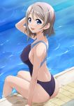  1girl ass back blue_eyes blue_swimsuit blush breasts brown_hair collarbone competition_swimsuit hand_to_own_head looking_at_viewer love_live! love_live!_sunshine!! medium_breasts miel_(lessontome) one-piece_swimsuit open_mouth pool poolside ripples short_hair sitting smile solo swimsuit wading watanabe_you water wet wet_clothes wet_swimsuit 