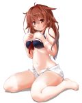  1girl adapted_costume belly bikini black_bikini blush breasts brown_hair dd_(ijigendd) hair_flaps hairband hands_on_own_chest highres kantai_collection long_hair looking_at_viewer medium_breasts orange_eyes red_hairband remodel_(kantai_collection) shiratsuyu_(kantai_collection) shorts simple_background sitting smile solo swimsuit tan tanline wariza white_background 