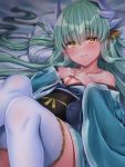  1girl bed blush breasts cleavage eyebrows_visible_through_hair fate/grand_order fate_(series) green_hair hair_between_eyes hands_on_own_chest heart highres horns japanese_clothes jiiwara kiyohime_(fate/grand_order) long_hair looking_at_viewer lying on_back pillow sash smile solo thigh-highs very_long_hair white_legwear yellow_eyes 
