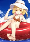  1girl :d barefoot bikini blonde_hair blue_sky breasts clouds collarbone commentary day eyebrows_visible_through_hair fang feet flan_(seeyouflan) flandre_scarlet hair_between_eyes hand_on_headwear hat highres innertube looking_at_viewer medium_hair open_mouth orange_bikini orange_eyes outdoors side_ponytail sky small_breasts smile soles solo swimsuit toes touhou water white_hat 