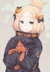  1girl abigail_williams_(fate/grand_order) alternate_hairstyle bandaid_on_forehead bangs belt black_bow black_jacket blonde_hair blue_eyes blush bow commentary dotted_background fate/grand_order fate_(series) forehead grey_background hair_bow hair_bun high_collar highres holding holding_stuffed_animal jacket long_hair looking_at_viewer orange_bow parted_bangs parted_lips polka_dot polka_dot_bow sleeves_past_fingers sleeves_past_wrists solo somnium stuffed_animal stuffed_toy teddy_bear 