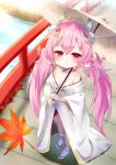  1girl autumn_leaves azur_lane blurry blurry_background blush breasts bridge brown_umbrella closed_mouth commentary_request day depth_of_field flower hair_flower hair_ornament hamakaze_(azur_lane) headgear highres holding holding_umbrella japanese_clothes kimono koko_ne_(user_fpm6842) leaf long_hair maple_leaf off_shoulder oriental_umbrella outdoors pink_hair red_eyes red_flower river small_breasts smile solo standing table twintails umbrella very_long_hair water white_flower white_kimono white_legwear 