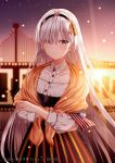  1girl absurdres american_flag anastasia_(fate/grand_order) bangs black_hairband black_skirt blue_eyes blurry blurry_background blush closed_mouth collared_shirt commentary_request crossed_arms depth_of_field dress dress_shirt eyebrows_visible_through_hair fate/grand_order fate_(series) flag golden_gate_bridge hair_over_one_eye hairband high-waist_skirt highres holding holding_flag junpaku_karen long_hair long_sleeves looking_at_viewer outdoors pixiv_id puffy_long_sleeves puffy_sleeves see-through shawl shirt silver_hair skirt sky solo standing striped vertical-striped_skirt vertical_stripes very_long_hair white_dress 
