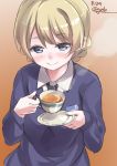  1girl bangs black_neckwear blonde_hair blue_eyes blue_sweater blush braid brown_background closed_mouth commentary cup darjeeling dated dress_shirt emblem eyebrows_visible_through_hair gedoo_(gedo) girls_und_panzer highres holding holding_cup long_sleeves looking_at_viewer necktie saucer school_uniform shirt short_hair smile solo st._gloriana&#039;s_school_uniform sweater tea teacup tied_hair twin_braids twitter_username upper_body v-neck white_shirt wing_collar 
