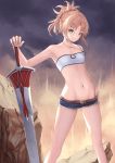  1girl absurdres armpits bandeau bare_legs belt blonde_hair braid breasts clouds cloudy_sky commentary_request cutoffs denim denim_shorts fate/grand_order fate_(series) feet_out_of_frame french_braid green_eyes hair_ornament hair_scrunchie halterneck highres mordred_(fate) mordred_(fate)_(all) navel nekobell outdoors ponytail red_scrunchie rock scrunchie short_shorts shorts sky small_breasts smile solo thighs 