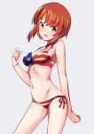  1girl american_flag_bikini arm_behind_back bangs bikini blush breasts brown_eyes brown_hair cleavage commentary cowboy_shot embarrassed eyebrows_visible_through_hair flag_print frown girls_und_panzer looking_at_viewer medium_breasts navel nishizumi_miho open_mouth shigekiman short_hair side-tie_bikini simple_background solo standing swimsuit 