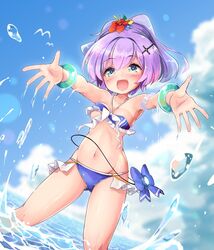  1girl :d azur_lane bikini blue_bikini blue_sky blush bouncing_breasts bracelet breasts clouds cloudy_sky cross_hair_ornament day dutch_angle eyebrows_visible_through_hair flower gluteal_fold green_eyes hair_flower hair_ornament highres javelin_(azur_lane) jewelry medium_breasts navel nyafu_(moai_lion) open_mouth purple_hair sky smile solo swimsuit wading 