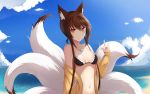 1girl animal_ears beach bikini breasts brown_hair cleavage fox_ears fox_girl fox_tail girls_frontline highres jacket jewelry looking_at_viewer multiple_tails necklace off_shoulder red_eyes sidelocks smile solo swimsuit tail type_79_(girls_frontline) xiaobai_(cheng_pan) 