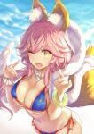  1girl ;d animal_ears bangs bikini blue_bikini blurry blurry_background breasts cleavage commentary_request day depth_of_field eyebrows_visible_through_hair fang fate/extra fate/grand_order fate_(series) fingernails fox_ears fox_girl fox_shadow_puppet fox_tail hair_between_eyes hands_up large_breasts navel one_eye_closed open_mouth outdoors pink_hair shintou side-tie_bikini smile solo standing swimsuit tail tail_raised tamamo_(fate)_(all) tamamo_no_mae_(swimsuit_lancer)_(fate) water yellow_eyes 