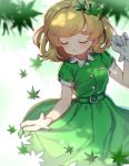 1girl aki_shizuha alternate_color bangs belt blonde_hair blurry_foreground breasts cowboy_shot day dress flower gloves green_dress hair_flower hair_ornament hand_up highres leaf light_particles maple_leaf satomachi short_hair short_sleeves small_breasts smile solo summer touhou tree_shade white_gloves 