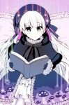  1girl :o blush book capelet commentary_request dress eyebrows_visible_through_hair fate/extra fate_(series) fur_trim gloves hat hat_ribbon highres holding long_hair long_sleeves looking_at_viewer neck_ribbon nursery_rhyme_(fate/extra) nyokichi_(nyokitto!) open_book parted_lips purple_dress purple_hat ribbon sitting solo very_long_hair 