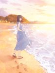  1girl :d beach black_hair blue_dress brown_eyes dress dress_lift from_side full_body highres lifted_by_self looking_at_viewer looking_to_the_side ocean open_mouth original ryuga_(balius) sandals short_hair short_sleeves smile solo sunset 