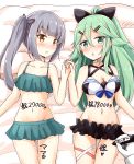  2girls adapted_costume aikawa_ryou bangs bikini bikini_skirt black_bikini black_ribbon blush brown_eyes commentary_request cowboy_shot frilled_bikini frills green_bikini green_eyes green_hair green_skirt grey_hair hair_between_eyes hair_ornament hair_ribbon hairclip highres kantai_collection kasumi_(kantai_collection) long_hair lying marker multiple_girls parted_bangs parted_lips ponytail ribbon side_ponytail sidelocks skirt swimsuit translated yamakaze_(kantai_collection) 