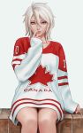  1girl 2018 bangs blue_eyes brick canadian_flag clothes_writing commentary english english_commentary expressionless finger_to_mouth grey_background grey_hair hair_between_eyes hand_up highres jersey lips long_sleeves looking_at_viewer no_pants nose number original parted_lips sciamano240 short_hair signature simple_background sitting sleeves_past_wrists solo 