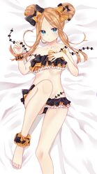  1girl abigail_williams_(fate/grand_order) bangs bare_arms bare_legs bare_shoulders barefoot bed_sheet bikini black_bikini black_bow blonde_hair blue_eyes blush bow closed_mouth collarbone commentary_request double_bun emerald_float eyebrows_visible_through_hair fate/grand_order fate_(series) forehead groin hair_bow highres knee_up looking_at_viewer lying nekomiya_noru_(yuduki710) on_back orange_bow parted_bangs side_bun solo swimsuit toenails 