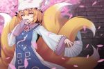  1girl blonde_hair cherry_blossoms covered_mouth dress fan folding_fan fox_tail hat kitsune long_sleeves multiple_tails nyifu ofuda petals pillow_hat short_hair tabard tail touhou wide_sleeves yakumo_ran yellow_eyes 