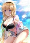  1girl bangs bikini black_bikini black_bow blonde_hair blue_sky blurry blurry_background bow bow_bikini braid breasts cleavage clouds commentary_request day depth_of_field eyebrows_visible_through_hair fate/grand_order fate_(series) hair_between_eyes hand_up highres hood hood_down hooded_jacket horizon iroha_(shiki) jacket jeanne_d&#039;arc_(fate)_(all) jeanne_d&#039;arc_(swimsuit_archer) large_breasts long_hair long_sleeves navel ocean off_shoulder outdoors revision sky solo swimsuit very_long_hair violet_eyes water wet white_jacket 