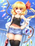  1girl :d bangs bare_shoulders black_legwear blonde_hair blue_sky blush bottle camisole clouds cola collarbone commentary_request cowboy_shot day denim denim_shorts dutch_angle eyebrows_visible_through_hair eyes_visible_through_hair fangs flandre_scarlet hair_between_eyes hand_on_hip highres holding holding_bottle long_hair looking_at_viewer m9kndi midriff navel no_hat no_headwear off_shoulder one_side_up open_mouth outdoors railing red_eyes shirt short_shorts shorts sky smile solo spaghetti_strap standing stomach thigh-highs thighs touhou white_shirt 