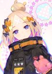  1girl abigail_williams_(fate/grand_order) alternate_hairstyle atsumi_jun bandaid_on_forehead bangs belt black_bow black_jacket blonde_hair blue_eyes blush bow fate/grand_order fate_(series) forehead hair_bow hair_bun heroic_spirit_traveling_outfit high_collar holding holding_stuffed_animal jacket long_hair looking_at_viewer orange_bow parted_bangs parted_lips polka_dot polka_dot_bow sleeves_past_fingers sleeves_past_wrists solo speech_bubble star stuffed_animal stuffed_toy teddy_bear 