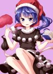  1girl :d apron bangs black_dress blob blue_eyes blue_hair blush book breasts commentary_request doremy_sweet dress eyebrows_visible_through_hair feet_out_of_frame hands_up hat highres holding holding_book index_finger_raised knees_up long_hair looking_at_viewer medium_breasts open_mouth pom_pom_(clothes) ponytail purple_background red_hat ruu_(tksymkw) santa_hat short_sleeves simple_background smile solo tail tapir_tail thighs touhou waist_apron white_apron 