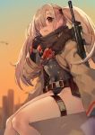  1girl bada_(jksh5056) bangs black_gloves black_leotard blurry blurry_background breasts brown_belt brown_eyes building commentary_request depth_of_field elbow_gloves eyebrows_visible_through_hair fur-trimmed_jacket fur_trim girls_frontline gloves hair_over_one_eye highres hk21 hk21_(girls_frontline) iron_cross jacket leotard light_brown_hair long_hair long_sleeves object_namesake open_clothes open_jacket open_mouth sitting sky skyscraper small_breasts solo twintails upper_teeth very_long_hair weapon weapon_on_back white_jacket wide_sleeves 
