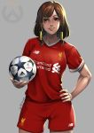  1girl ball brand_name_imitation breasts cleavage commentary cowboy_shot dark_skin facial_tattoo hair_ornament large_breasts liverpool_fc looking_at_viewer lulu-chan92 overwatch pharah_(overwatch) play_of_the_game premier_league short_hair signature simple_background soccer soccer_uniform sponsor sportswear tattoo uefa_champions_league 