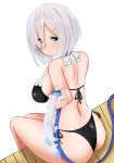  1girl alternate_costume ass bikini black_bikini blue_eyes blush breasts closed_mouth eyebrows_visible_through_hair grey_hair hair_between_eyes hair_ornament hairclip hamakaze_(kantai_collection) hifumi_kei highres hose kantai_collection large_breasts looking_at_viewer short_hair simple_background sitting smile solo swimsuit water white_background 