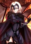  1girl ahoge armor blonde_hair embers fate/grand_order fate_(series) fire headpiece highres jeanne_d&#039;arc_(alter)_(fate) jeanne_d&#039;arc_(fate)_(all) shiguru short_hair smirk solo standard_bearer thigh-highs yellow_eyes 