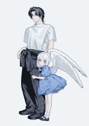  1boy 1girl age_difference angel_wings black_hair blue_dress bobby_socks clothes_around_waist commentary dress expressionless full_body grey_eyes highres hugging_another&#039;s_leg looking_at_viewer mary_janes nanoka_san original shirt shoes short_hair socks sweater sweater_around_waist t-shirt white_hair white_wings wings 