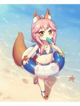  1girl animal_ear_fluff animal_ears bangs bare_shoulders beach bikini blue_bikini blush bracelet brown_footwear brown_hair eyebrows_visible_through_hair fate/grand_order fate_(series) flat_chest food food_in_mouth fox_ears fox_girl fox_tail highres holding holding_innertube innertube jewelry langbazi letterboxed long_hair looking_at_viewer mouth_hold navel necklace outdoors pink_hair popsicle sand sandals side-tie_bikini sidelocks signature solo standing standing_on_one_leg starfish sunset swimsuit tail tail_raised tamamo_(fate)_(all) tamamo_no_mae_(swimsuit_lancer)_(fate) water younger 
