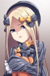  1girl abigail_williams_(fate/grand_order) absurdres bangs black_bow black_dress black_hat blonde_hair blue_eyes bow brown_background commentary_request dress fate/grand_order fate_(series) forehead gradient gradient_background hair_bow hat head_tilt highres long_hair long_sleeves looking_at_viewer mkon object_hug orange_bow parted_bangs parted_lips polka_dot polka_dot_bow shaded_face sleeves_past_fingers sleeves_past_wrists solo stuffed_animal stuffed_toy teddy_bear upper_body upper_teeth very_long_hair 
