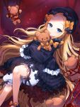  1girl abigail_williams_(fate/grand_order) bangs black_dress black_hat blonde_hair blue_eyes blush bound bow commentary_request dress fate/grand_order fate_(series) forehead frilled_sleeves frills hair_bow hat highres lerome long_hair object_hug orange_bow parted_bangs polka_dot polka_dot_bow red_bow red_ribbon ribbon ribbon_bondage sleeves_past_fingers sleeves_past_wrists solo stuffed_animal stuffed_toy teddy_bear tied_up underwear very_long_hair white_bloomers 