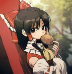  1girl ascot black_hair bow cookie detached_sleeves dutch_angle eating expressionless food hair_bow hair_tubes hakurei_reimu ka_(marukogedago) long_hair looking_at_viewer nontraditional_miko red_eyes sidelocks solo torii touhou tree wide_sleeves 