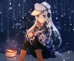  1girl black_background black_legwear blue_eyes boots brown_footwear camouflage_jacket commentary earmuffs eating feet_out_of_frame fish flat_cap grill hammer_and_sickle hat hibiki_(kantai_collection) highres kantai_collection kocona long_hair pantyhose shichirin silver_hair sitting snowflakes solo twitter_username verniy_(kantai_collection) white_hat 