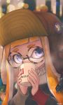  1girl aviator_cap bangs blue_eyes blunt_bangs blurry blurry_background cold cup drinking glasses hat highres holding holding_cup inkling kashu_(hizake) light_particles looking_at_viewer mug nintendo orange_hair round_eyewear signature sipping solo splatoon steam tentacle_hair upper_body 