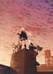  ak-12_(girls_frontline) an-94 an-94_(girls_frontline) assault_rifle black_legwear blonde_hair blurry brick_wall cape clouds depth_of_field from_below gan-viking girls_frontline gun highres ladder long_hair looking_afar rifle rooftop satellite_dish shorts sidelocks sitting sky standing sunlight sunset thigh_strap weapon wind 