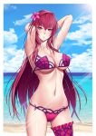 1girl absurdres arms_behind_head beach bikini blue_sky breasts cleavage clouds cowboy_shot day fate/grand_order fate_(series) highres large_breasts leg_garter light_rays long_hair looking_at_viewer navel ocean outdoors pink_bikini red_eyes redhead scathach_(fate)_(all) scathach_(fate/grand_order) scathach_(swimsuit_assassin)_(fate) sky solo standing sunbeam sunlight swimsuit xiao_gen 