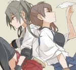  2girls back-to-back brown_eyes brown_hair commentary_request green_eyes grey_hair japanese_clothes kaga_(kantai_collection) kantai_collection looking_down looking_up multiple_girls paper_airplane ree_(re-19) short_hair side_ponytail sitting twintails zuikaku_(kantai_collection) 