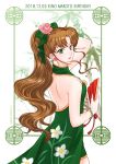  1girl artist_name back birthday bishoujo_senshi_sailor_moon border bow bracelet brown_hair character_name closed_mouth cowboy_shot dress earrings fan floral_print flower flower_earrings folding_fan green_border green_bow green_dress green_eyes hair_bow hair_flower hair_ornament jewelry kino_makoto koya long_hair looking_at_viewer looking_back pink_flower pink_rose rose sidelocks smile solo 