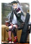  1girl absurdres assault_rifle asymmetrical_legwear black_shorts box cardboard_box coat commentary_request g11_(girls_frontline) girls_frontline green_hat green_jacket grey_hair gun hat heckler_&amp;_koch highres jacket kalina_(girls_frontline) knee_pads kumonji_aruto long_hair messy_hair open_clothes open_coat rifle shorts single_thighhigh sitting sleep_mask thigh-highs thigh_strap weapon 